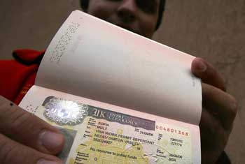Britain plans visa bonds for high-risk Asians - report