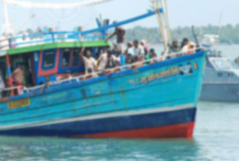 Navy intercepts 11 Sinhalese boat people