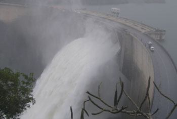 Laxapana reservoir sluice gates opened