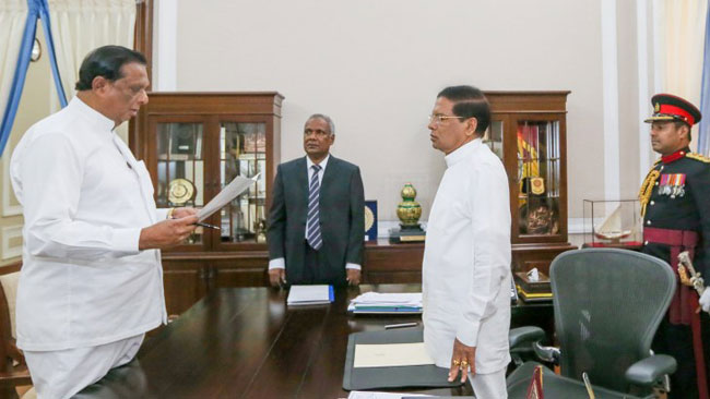 John Amaratunga takes oath as Minister of Lands