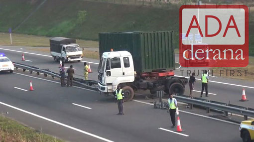 Container truck crashes into railing of Southern Expressway