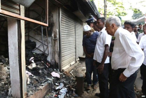 Compensation for Kandy violence: religious places given priority
