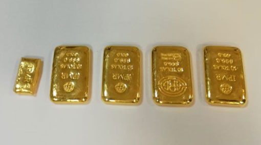 Indian arrested at BIA with 5 gold pieces in rectum