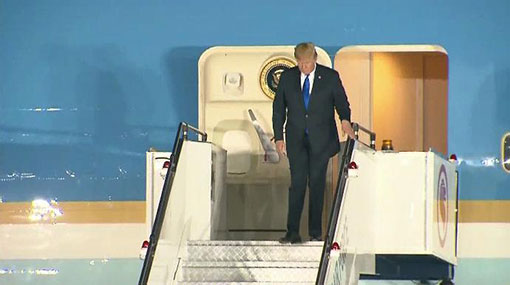 Trump arrives in Singapore for historic summit with North Koreas Kim