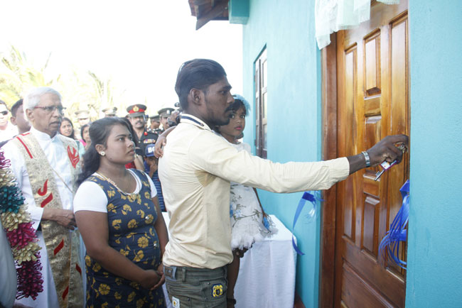 Jaffna security forces build new homes for low-income families