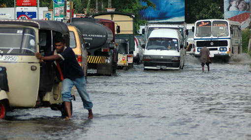 Tropical downpours to renew flood threat in Sri Lanka - report