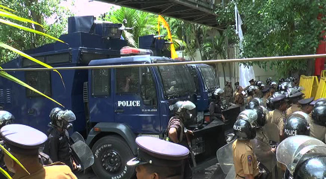 Police use water cannons on protesting university students