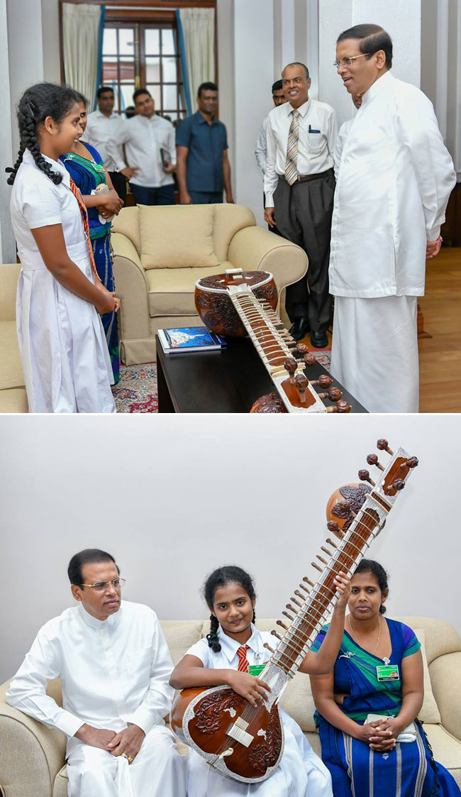 President gifts Sitar to student...
