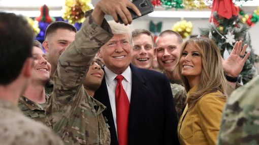 Trump makes surprise Christmas visit to US troops in Iraq