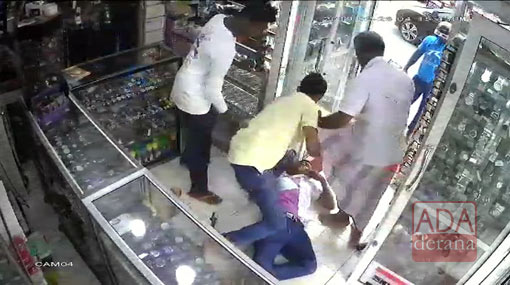 CCTV: Extortionist assaulted by shop owners