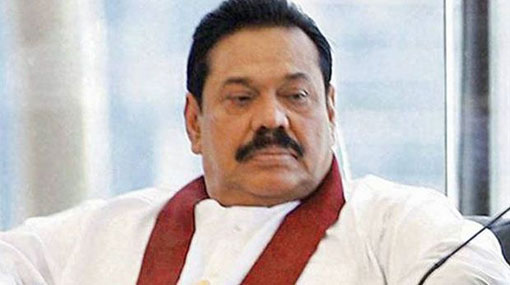 Mahinda arrives at Special Prez Commission