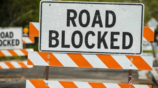 Lotus Road closed due to protest by uni students