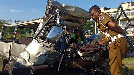 Ten including children killed in van-bus collision