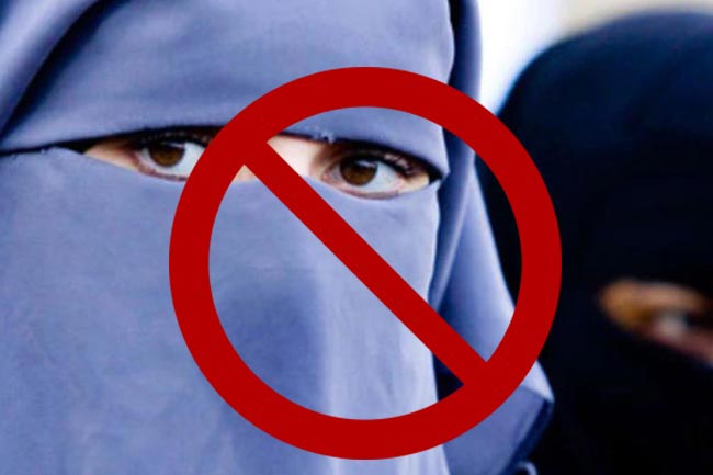 Covering of face to avoid identification banned