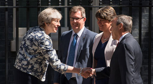 Theresa May strikes deal with Northern Irish DUP to back minority government