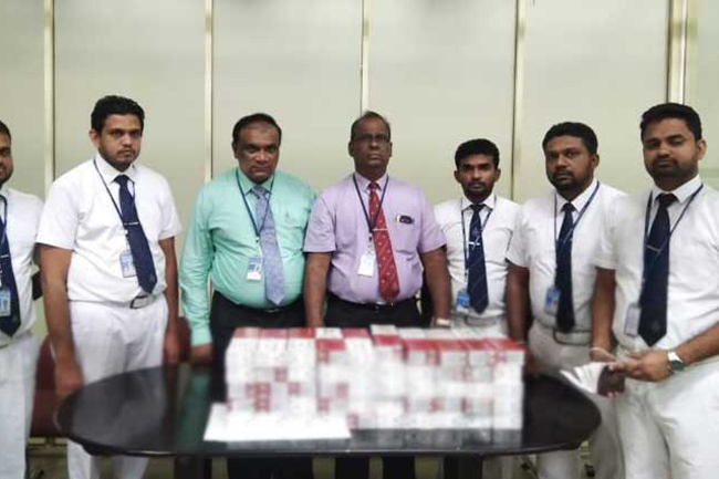 Lankan busted with thousands of foreign cigarette sticks