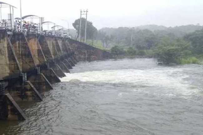 Two sluice gates of Kawdulla Reservoir opened