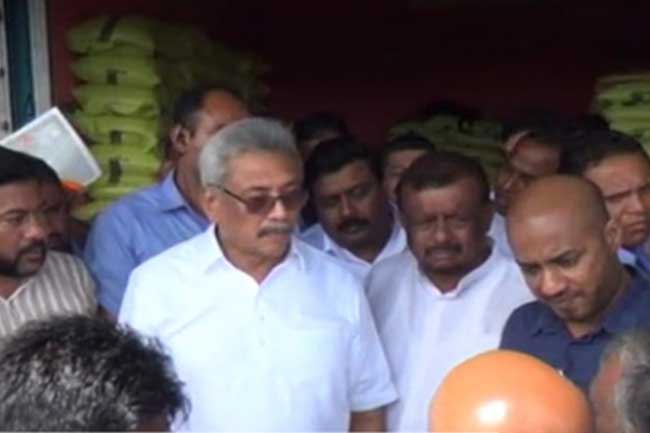 President inspects rice prices at Thambuttegama