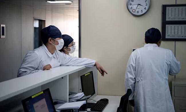 Wuhan hospital director dies of COVID-19 while death toll rises to 1,868
