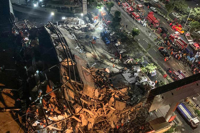 Dozens trapped as China coronavirus quarantine hotel collapses