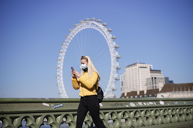 UK extends virus lockdown by at least 3 weeks