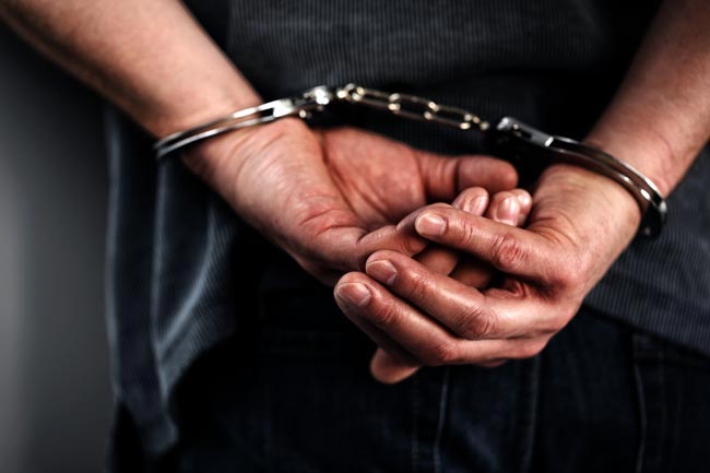 Wanted suspect arrested with hand grenade