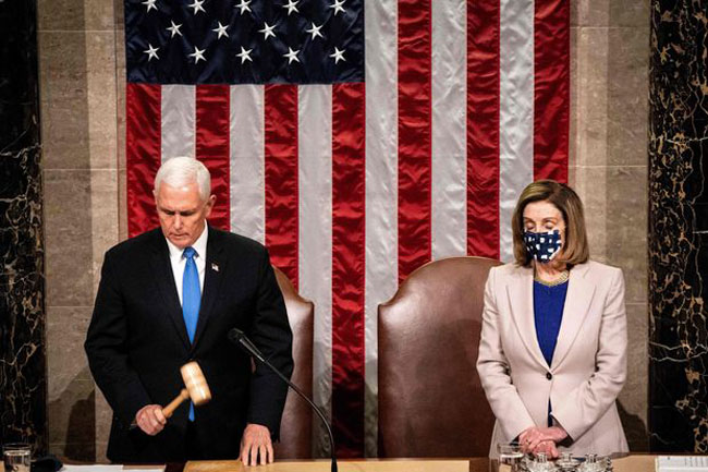 Congress confirms Bidens win hours after pro-Trump mobs assault on US Capitol