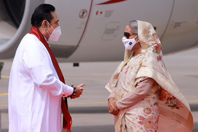 PM arrives in Dhaka, welcomed by Bangladeshi counterpart