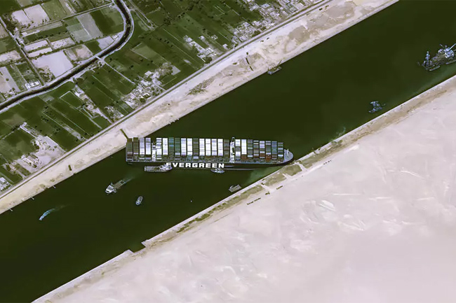 Suez Canal blockage: Crews still working to refloat container ship