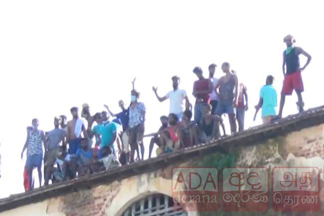 Bogambara Prison inmates launch protest on roof