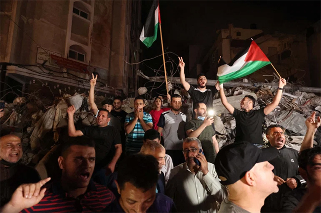 Israel-Hamas truce takes hold after 11 days of clash