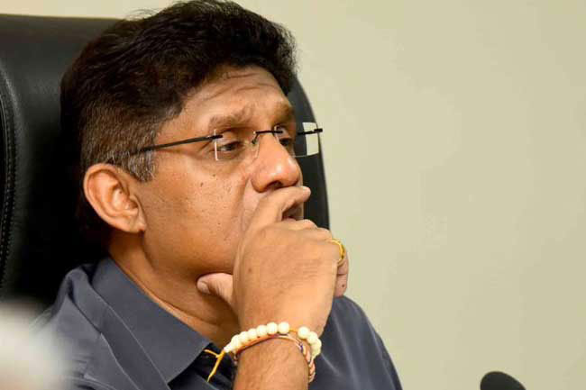 Drop fuel price without supplying jokes - Sajith