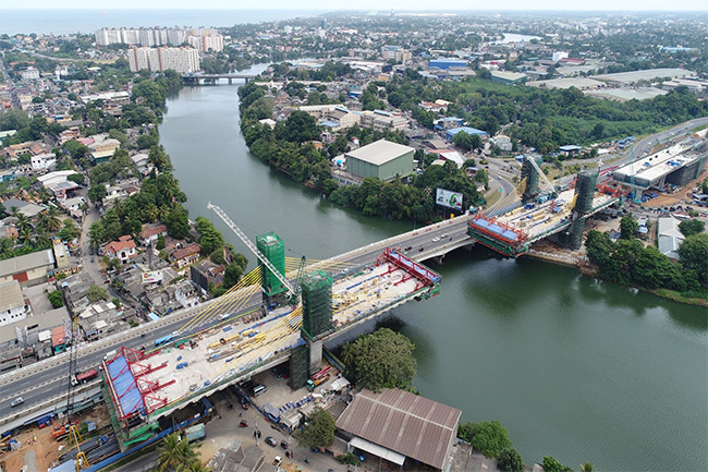 New Kelani Bridge connected at the centre over the river