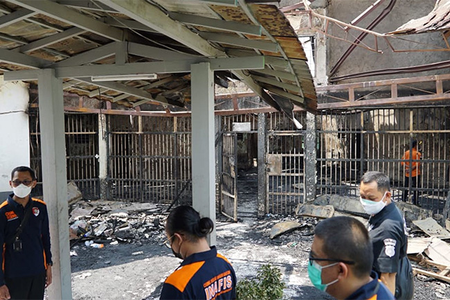 At least 40 killed in fire at overcrowded prison in Indonesia