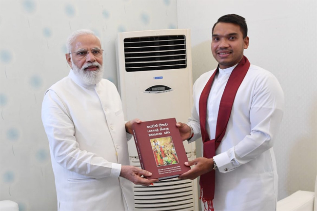 Namal meets PM Modi, gifts Sinhala version of Bhagavad Gita