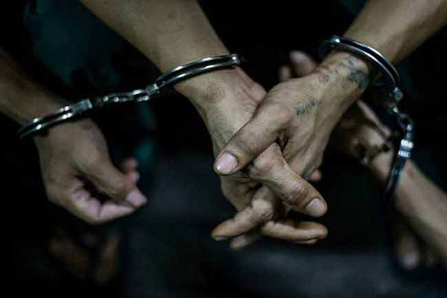 Eighteen suspects arrested over assault on three cops