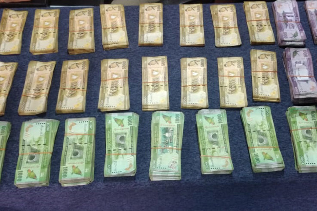 Woman who handled Harak Katas finances arrested with cash