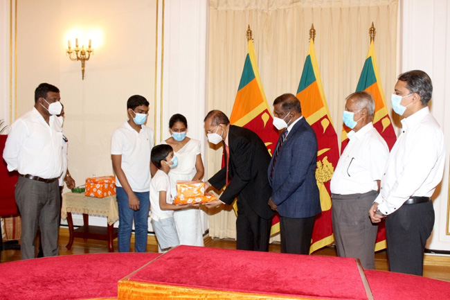 Foreign Minister hands over financial grant to Priyantha Kumaras family