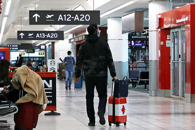 Canada to ease Covid-19 testing rules for vaccinated travelers