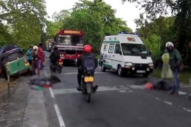 Three dead as three-wheeler and bus collide at Manampitiya