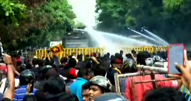 Police fire tear gas at protesters near Parliament