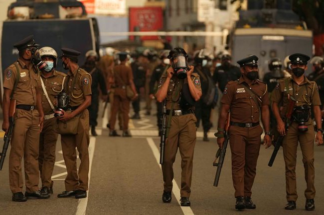 Curfew strictly enforced tonight; police permitted to open fire when necessary to prevent violence