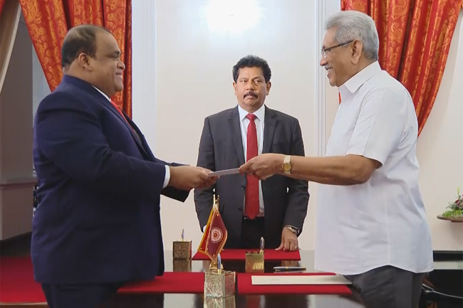 Dhammika Perera sworn in as a minister