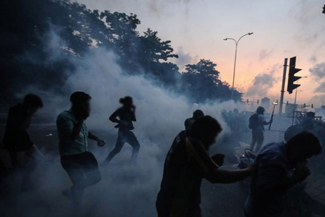 Suspect arrested with tear gas canisters stolen during protest