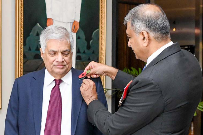 Remembrance Poppy Day: First poppy flower pinned on President