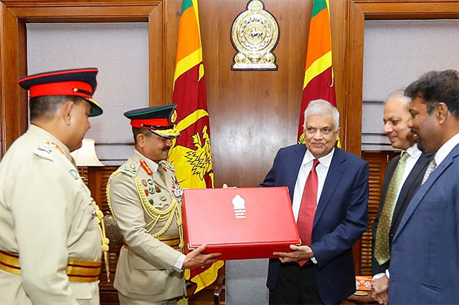 President receives attach case of international standards from SL Army