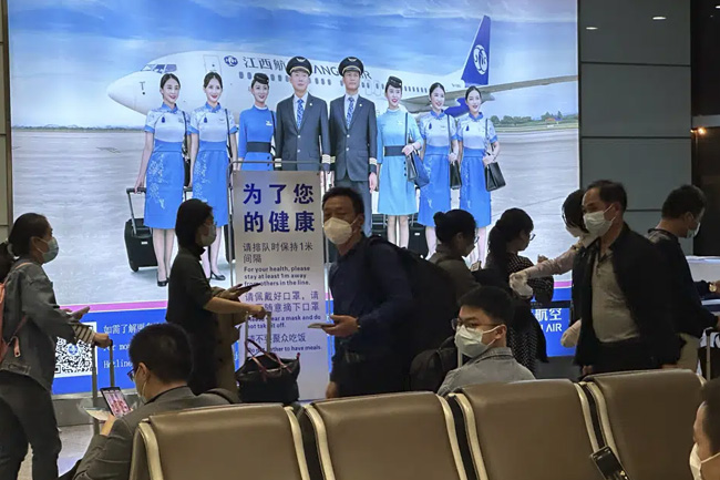 China to start issuing new passports as virus curbs ease