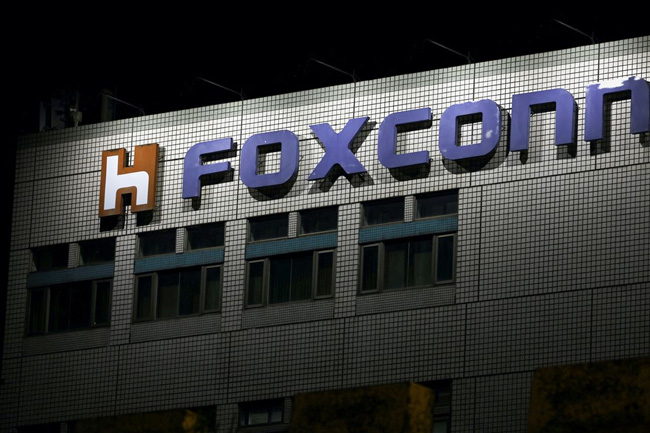 Foxconn’s COVID-hit China plant close to resuming full production, sources say