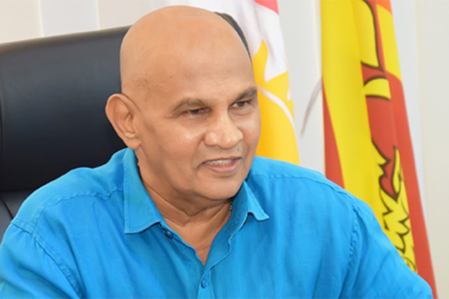 Former minister Reginald Cooray passes away