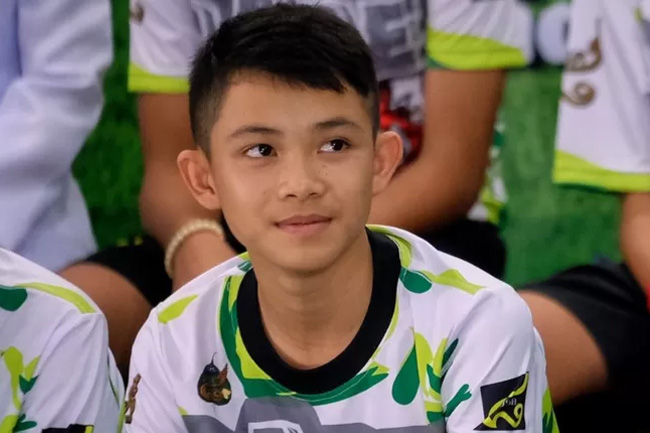 Boy who survived Thai cave rescue dies in UK